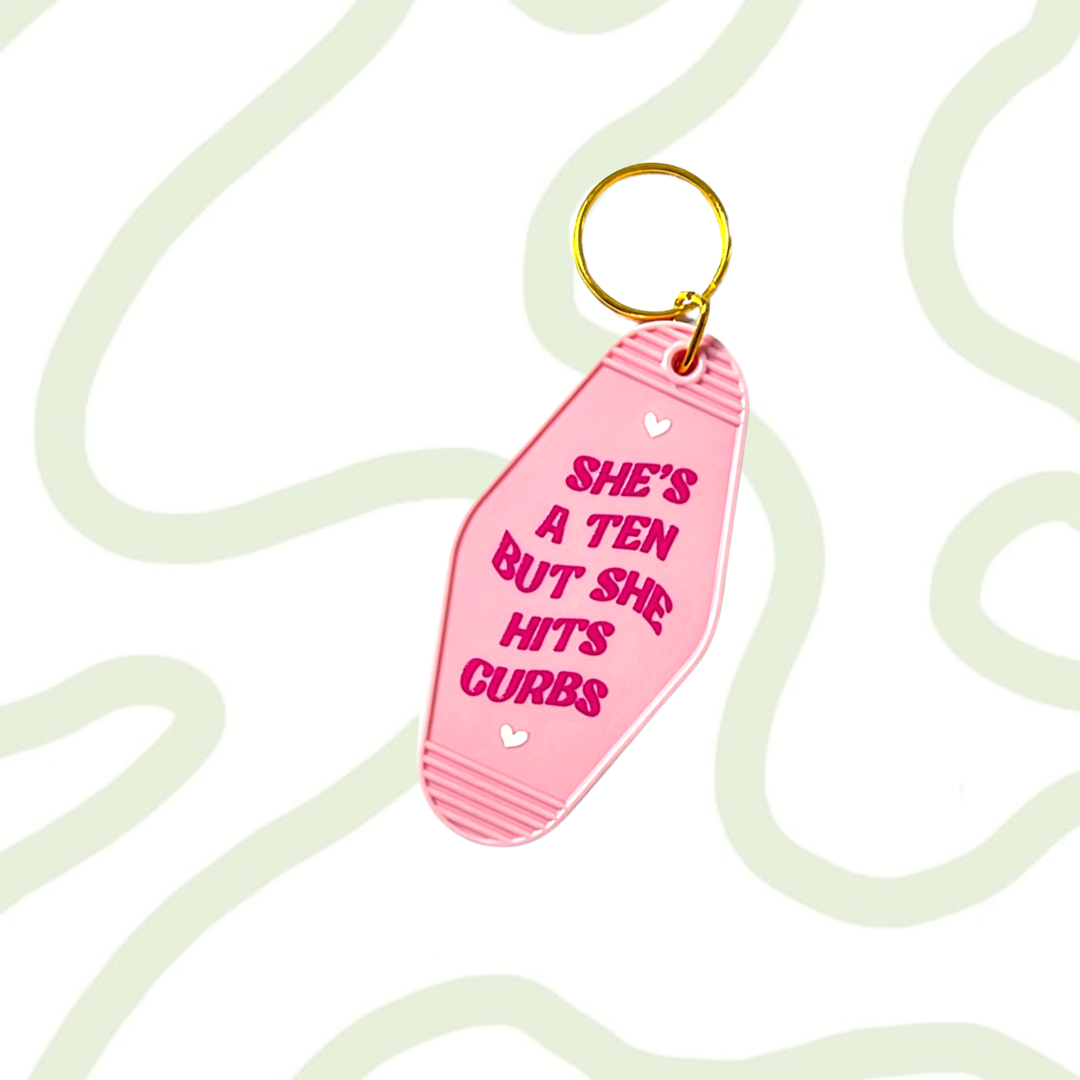 She's A Ten But She Hits Curbs Motel Keyring