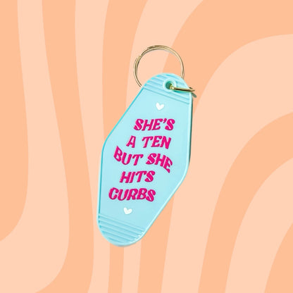 She's A Ten But She Hits Curbs Motel Keyring